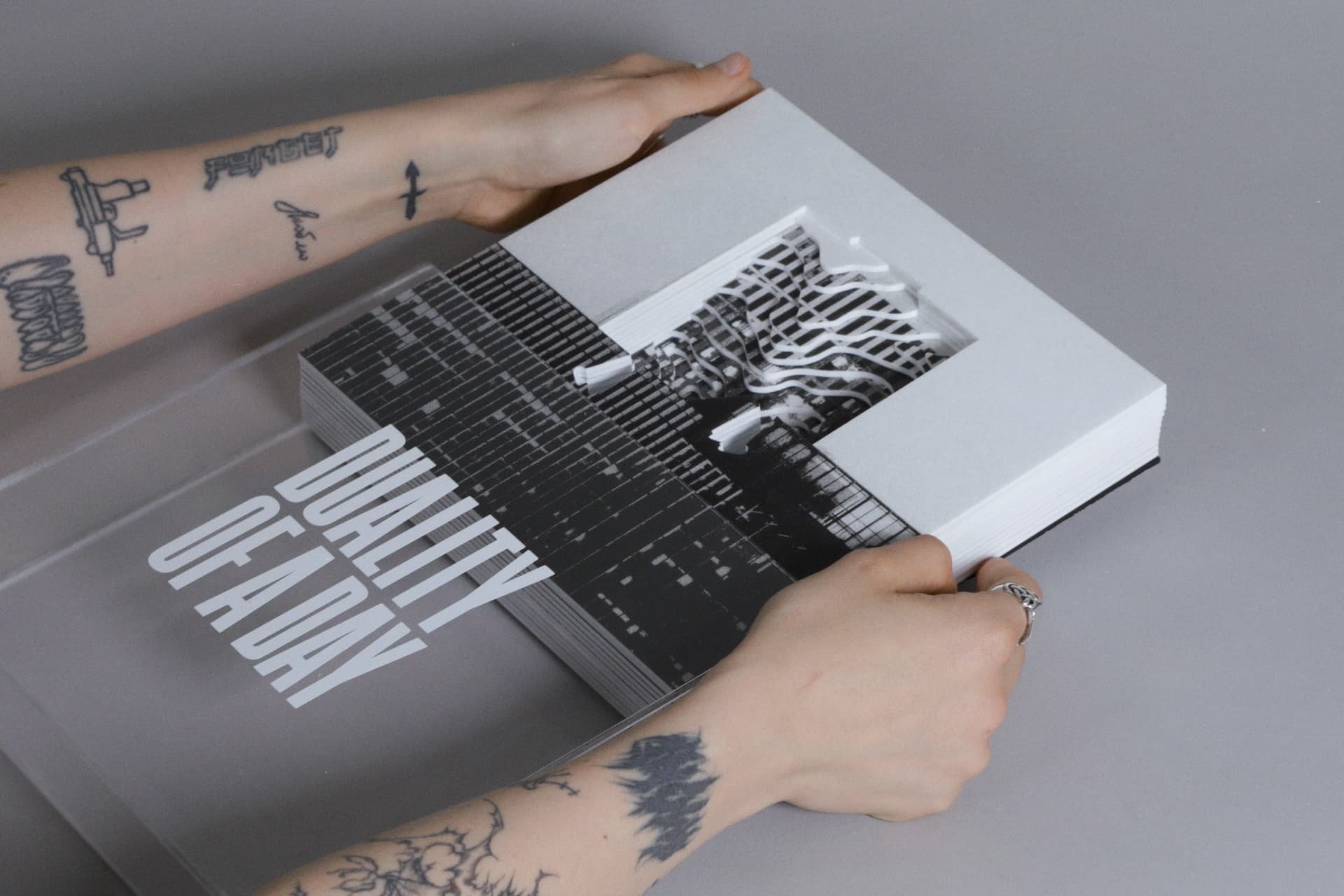 The lead outcomes layers are not attached, allowing viewers to explore each image on the layer, making it a tactile object. The square acrylic sheets are packaged within a transparent acrylic case, providing visibility of the outcome along with the title. 
