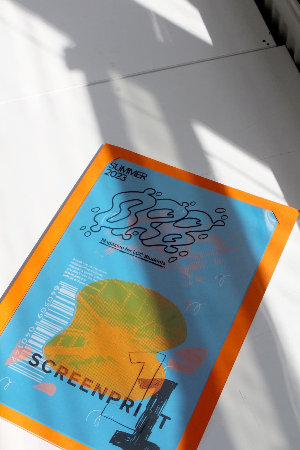 Cover with screen printed acetate sheets to make a interact-able magazine cover design, linking with the “layer” element of screen printing. 